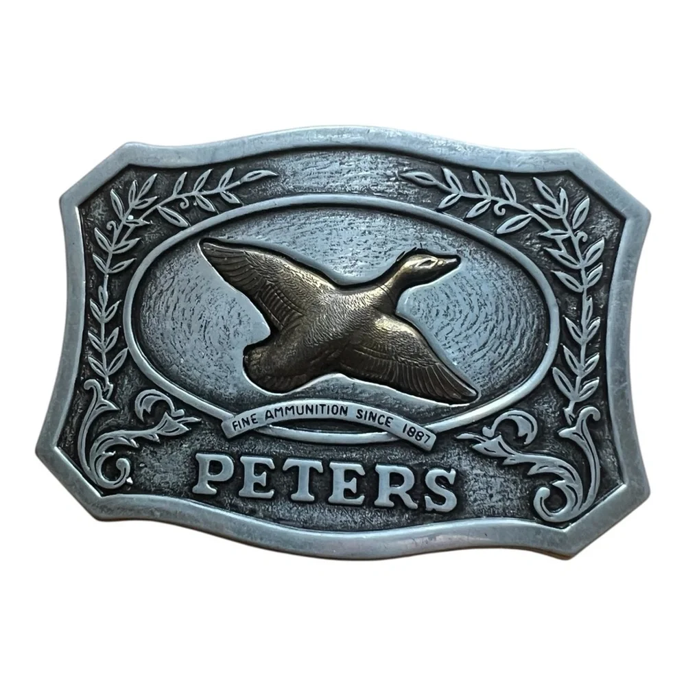 VTG. Peters Ammunition Remington Pewter Belt Buckle with flying duck.